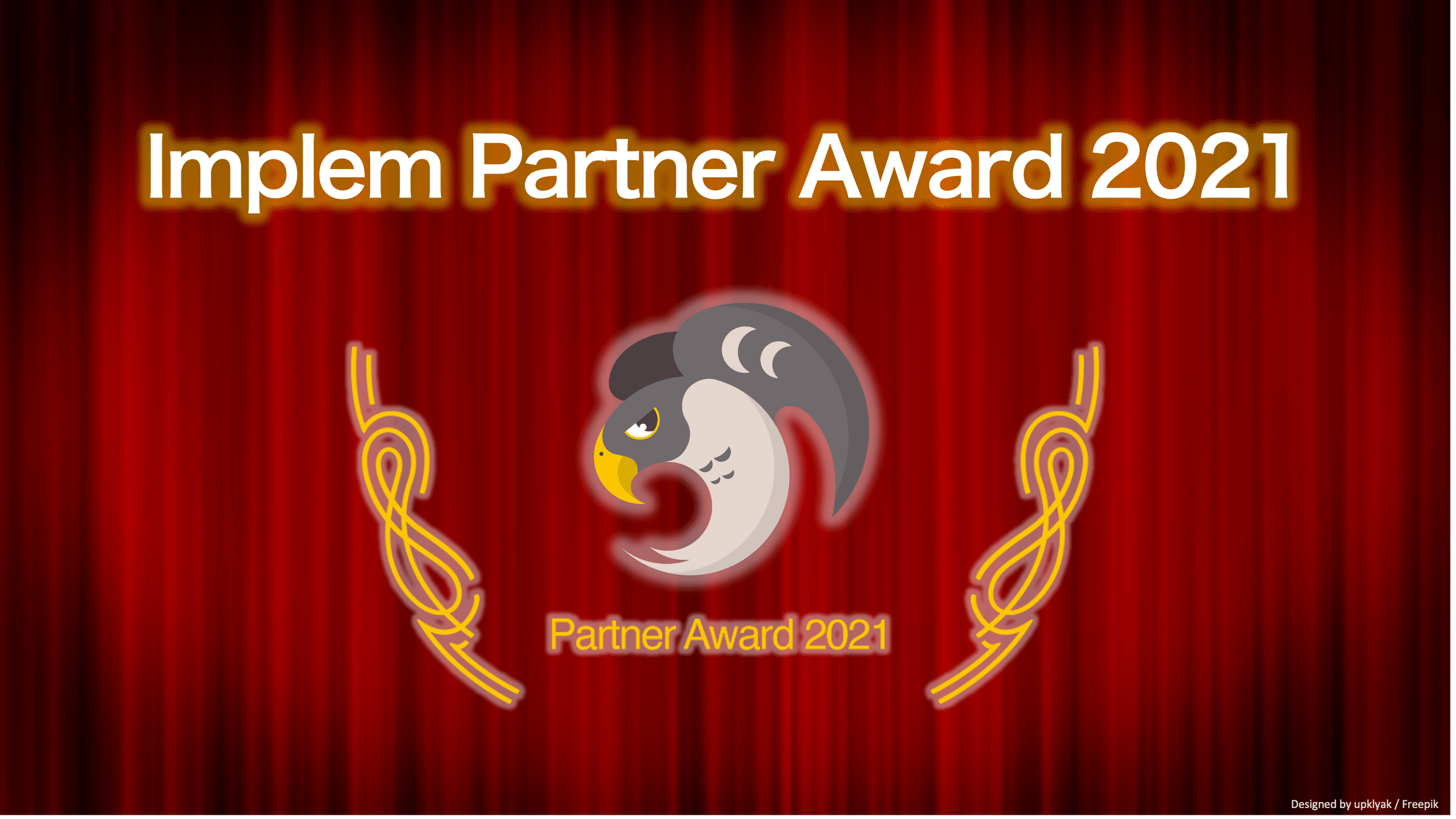 Implem Partner Award 2021 のロゴ(プリザンターのキャラクターと月桂樹)